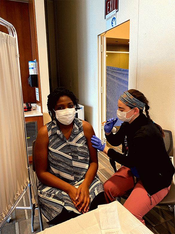 Woman getting vaccine